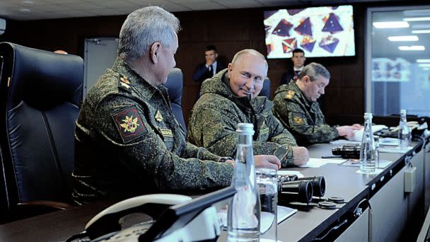 PHOTO: Russian President Vladimir Putin, accompanied by Defense Minister Sergei Shoigu (L) and Valery Gerasimov, the chief of the Russian General Staff, oversees the 'Vostok-2022' military exercises outside Ussuriysk, Russia, Sept. 6, 2022. (Mikhail Klimentyev/SPUTNIK via AFP via Getty Images)