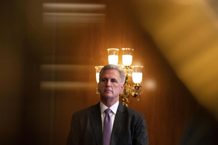 FILE - House Speaker Kevin McCarthy, of Calif., listens during a news conference in the Rayburn Room at the Capitol in Washington, May 11, 2023. (AP Photo/Nathan Howard, File)