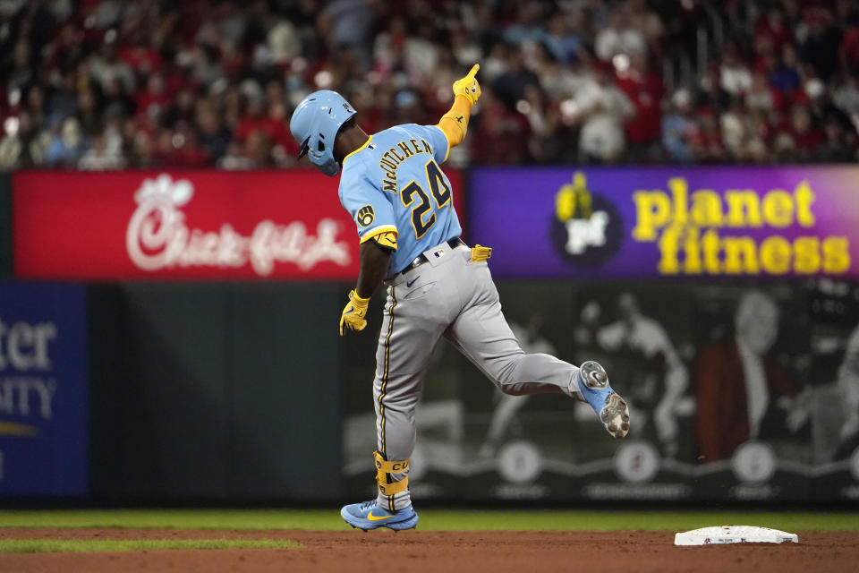 Milwaukee Brewers' Andrew McCutchen (24) rounds the bases after hitting a two-run home run during the fifth inning of a baseball game against the St. Louis Cardinals Tuesday, Sept. 13, 2022, in St. Louis. (AP Photo/Jeff Roberson)