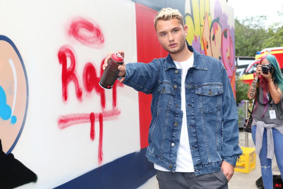 BERLIN, GERMANY - SEPTEMBER 01:  Rafferty Law, son of Jude Law, in front of the graffiti wall at the Tommy Hilfiger Denim Lab during the Bread & Butter by Zalando, arena Berlin on September 1, 2017 in Berlin, Germany.  (Photo by Gisela Schober/Getty Images for Zalando)