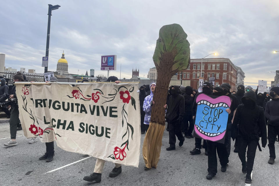 Demonstrators protest the death of an environmental activist, who went by Tortuguita, in Atlanta on Saturday, Jan. 21, 2023. Tortuguita was killed Wednesday, Jan. 18, after authorities said the 26-year-old shot a state trooper. Activists have questioned officials’ version of events, demanding an independent investigation. (AP Photo/R.J. Rico)