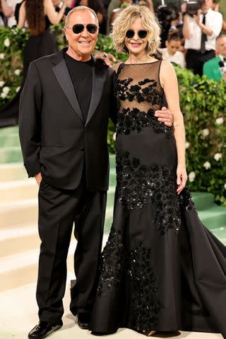 <p>Theo Wargo/GA/The Hollywood Reporter via Getty</p> Michael Kors and Meg Ryan attend the 2024 Met Gala at the Metropolitan Museum of Art in New York City on May 6, 2024