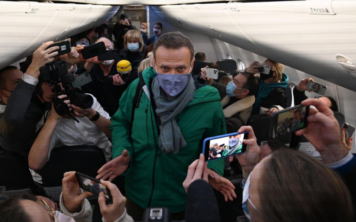 Alexei Navalny on the plane heading to Moscow -  KIRILL KUDRYAVTSEV/AFP
