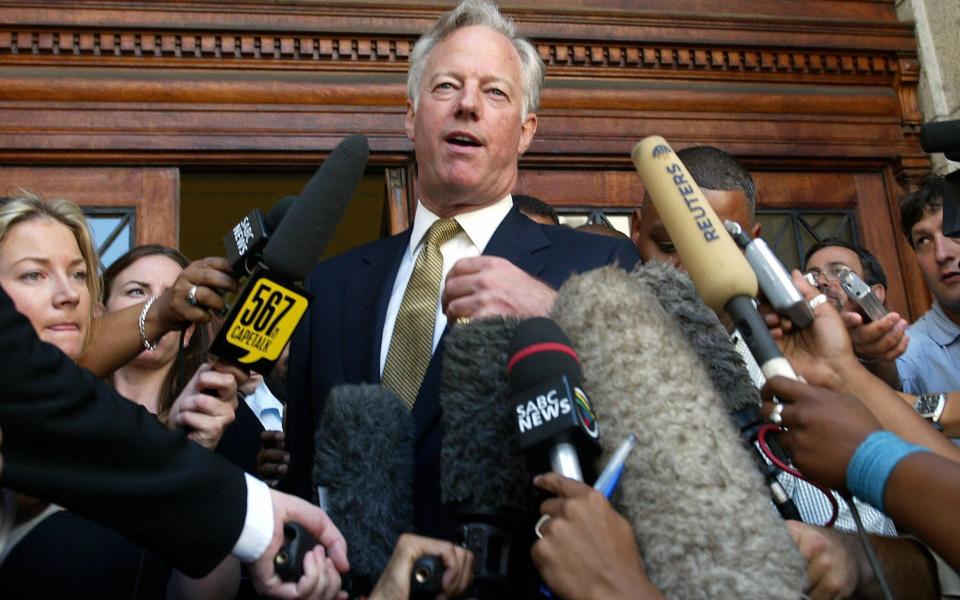 British businessman Mark Thatcher speaks to the media outside the High Court in Cape Town, 13 January 2004