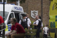 A view of the scene of an incident at a primary school, in Wimbledon, London, Thursday, July 6, 2023. London police say seven children and two adults were injured after a car crashed into an elementary school in Wimbledon in southwest London. (Victoria Jones/PA via AP)