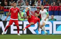 Soccer Football - World Cup - Group E - Serbia vs Switzerland - Kaliningrad Stadium, Kaliningrad, Russia - June 22, 2018 Serbia's Aleksandar Mitrovic attempts an overhead kick REUTERS/Ricardo Moraes