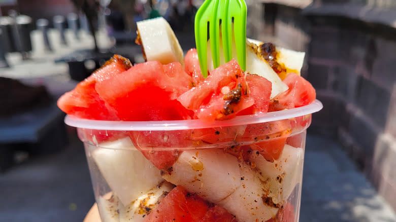 Mexican fruit cup with green fork