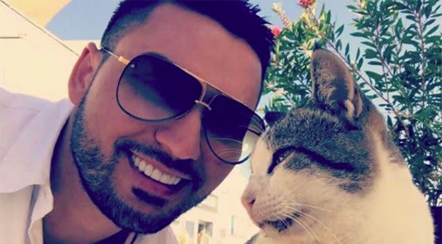 Mehajer pictured with a cat on holiday. Image: Instagram