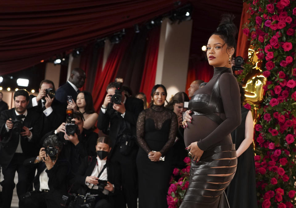 Rihanna arrives at the Oscars on Sunday, March 12, 2023, at the Dolby Theatre in Los Angeles. (Photo by Jordan Strauss/Invision/AP)