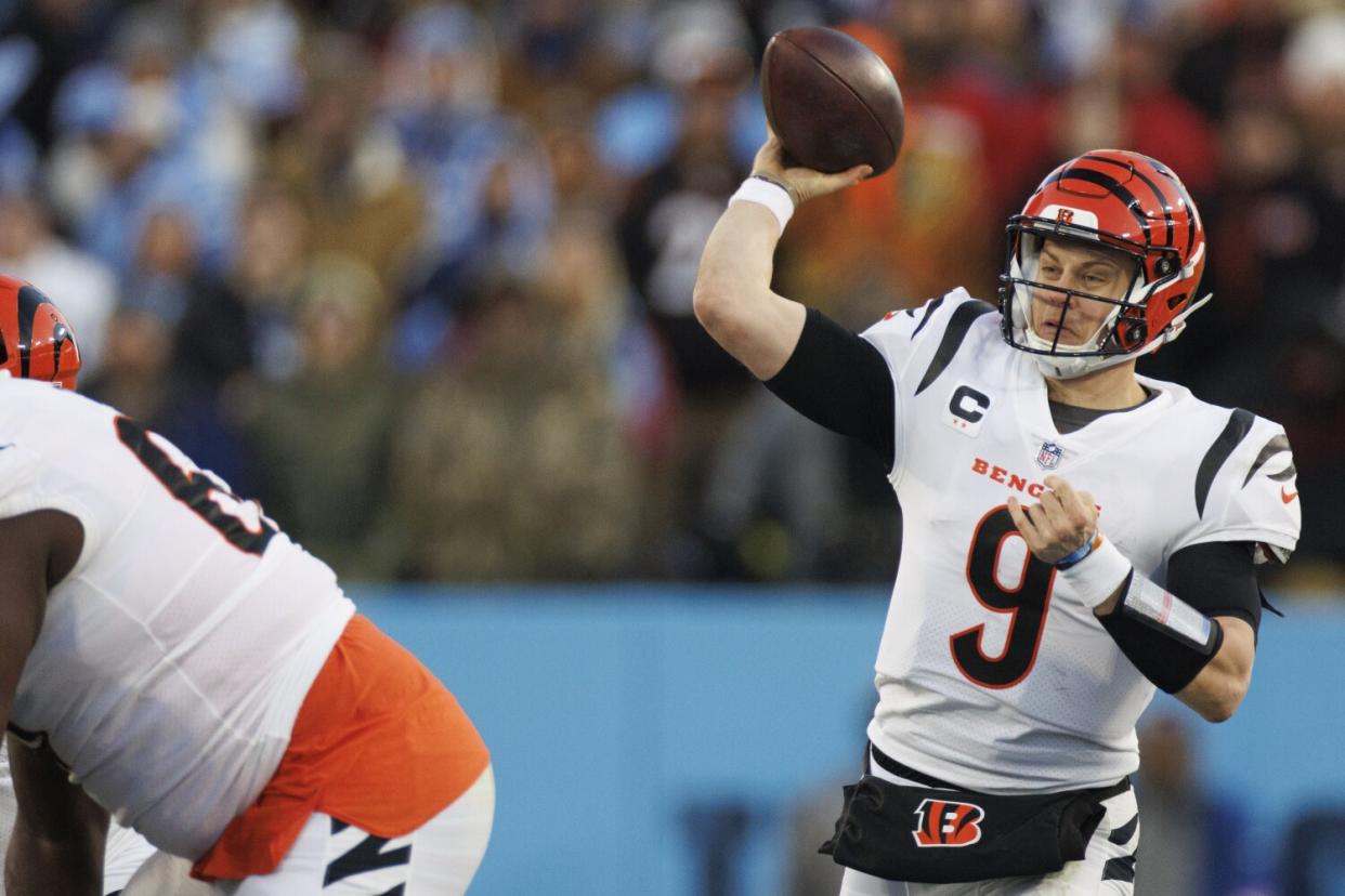 Cincinnati Bengals quarterback Joe Burrow passes during a divisional playoff win over the Tennessee Titans on Saturday.