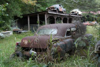 <p>This Cadillac Fleetwood Imperial four-door limousine appears to be a 1952 model, which means it’s one of 800 built. Sadly this one has been unloved for far too long, and has suffered as a consequence. Rust has taken a hold of the underside, and the missing glass has resulted in the interior being badly damaged. </p><p>With the price of scrap metal so high at the moment, the 4734 lb giant might even be worth more crushed.</p>