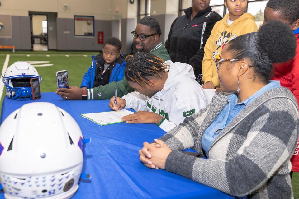 Millwood's Rickey Hunt Jr. signs with Ohio at Millwood High School on Wednesday.