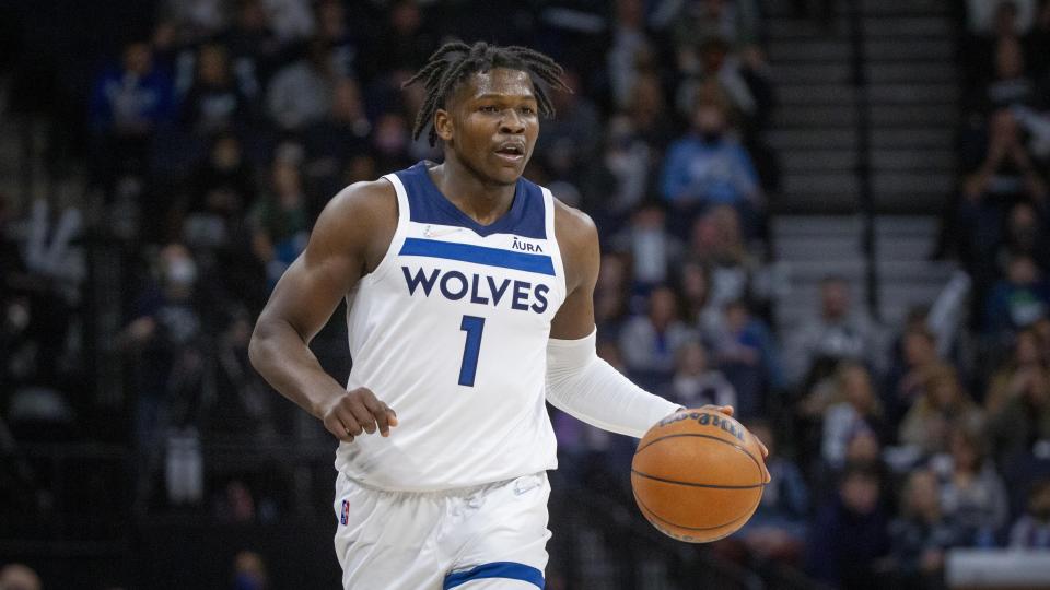 Minnesota Timberwolves guard Anthony Edwards brings the ball up court against the Oklahoma City Thunder in the first quarter of an NBA basketball game Wednesday, Jan. 5, 2022, in Minneapolis. (AP Photo/Bruce Kluckhohn)