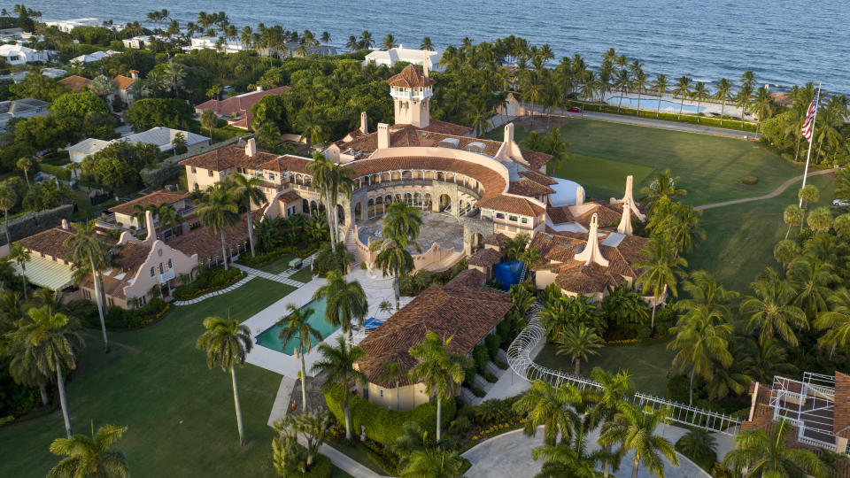 FILE - This is an aerial view of President Donald Trump's Mar-a-Lago estate, Aug. 10, 2022, in Palm Beach, Fla. The National Archives and Records Administration recovered 100 documents bearing classified markings, totaling more than 700 pages, from a initial batch of 15 boxes retrieved from Mar-a-Lago earlier this year. That's according to newly public correspondence with the Trump legal team. (AP Photo/Steve Helber, File)