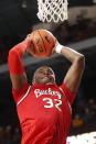 Ohio State forward E.J. Liddell dunks against Minnesota in the second half of an NCAA college basketball game Thursday, Jan. 27, 2022, in Minneapolis. (AP Photo/Bruce Kluckhohn)