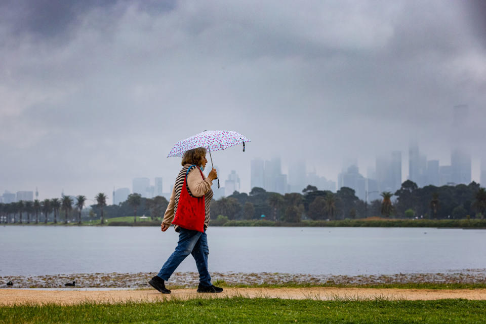 A woman bracing the cold weather in Melbourne. 