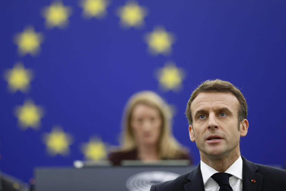 French President Emmanuel Macron delivers a speech, at the European Parliament Wednesday, Jan. 19, 2022 in Strasbourg, eastern France. (AP Photo/Jean-Francois Badias)