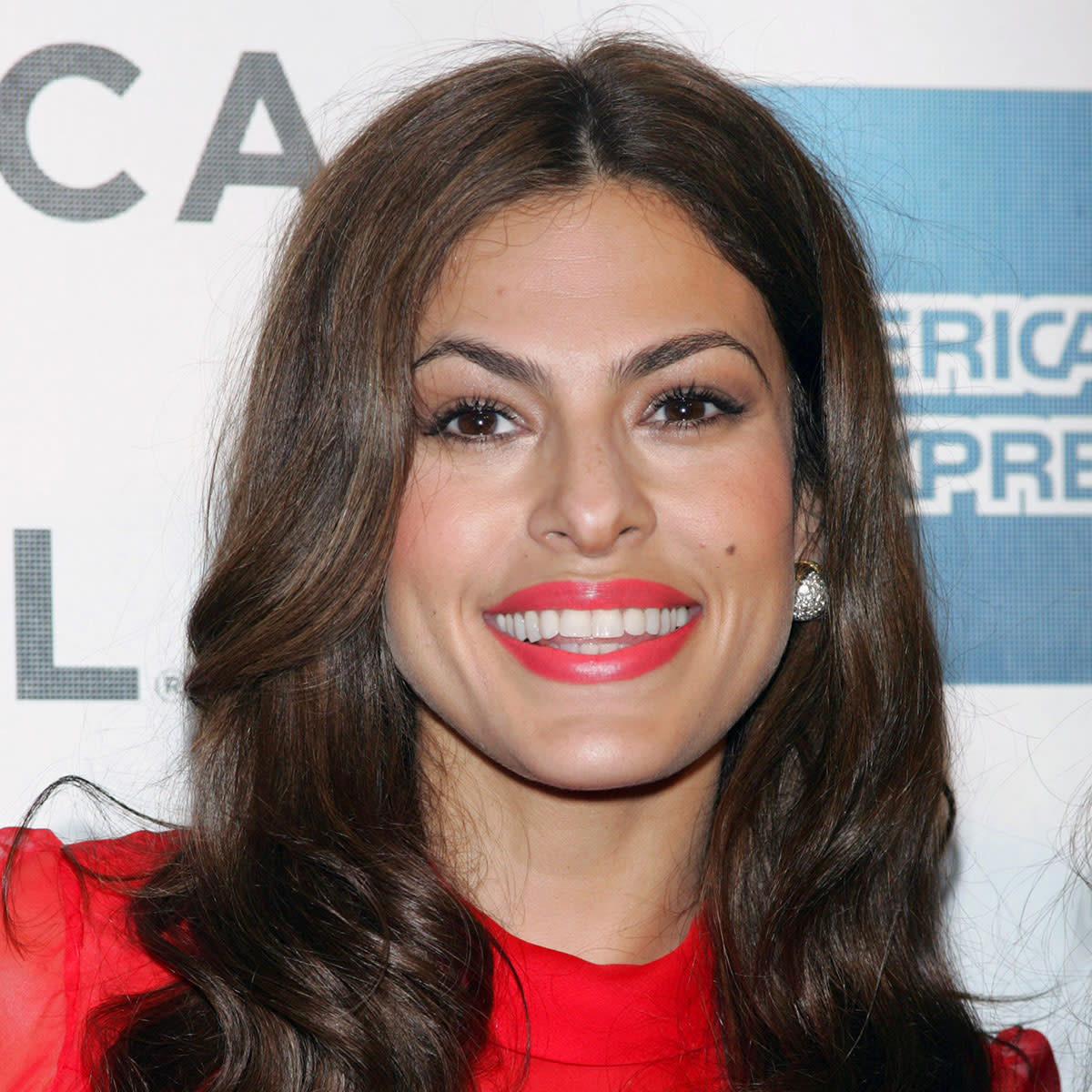 Eva Mendes red dress red lipstick smiling Tribeca Film Festival