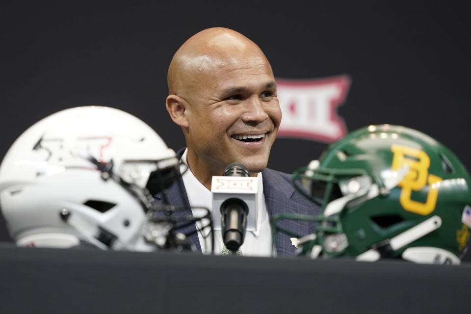 FILE - Baylor head coach Dave Aranda smiles while speaking at the NCAA college football Big 12 Media Days in Arlington, Texas, Wednesday, July 13, 2022. The Big 12 is going into its 12th and final season as a 10-team conference. (AP Photo/LM Otero, File)