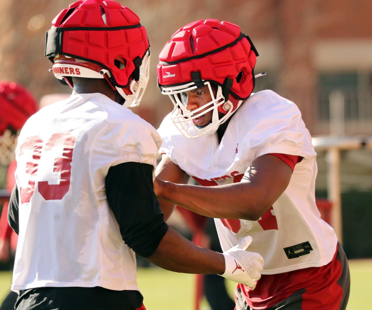 Adepoju Adebawore goes through drills as OU practices on March 21 outside Gaylord Family-Oklahoma Memorial Stadium in Norman.