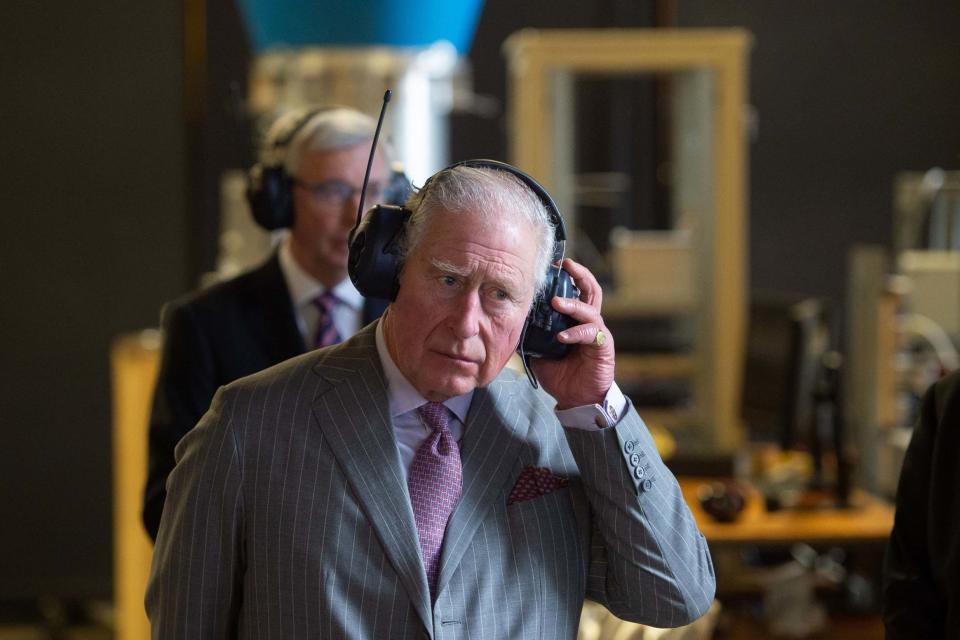 Prince Charles donned ear defenders during a wind tunnel demonstration (PA)