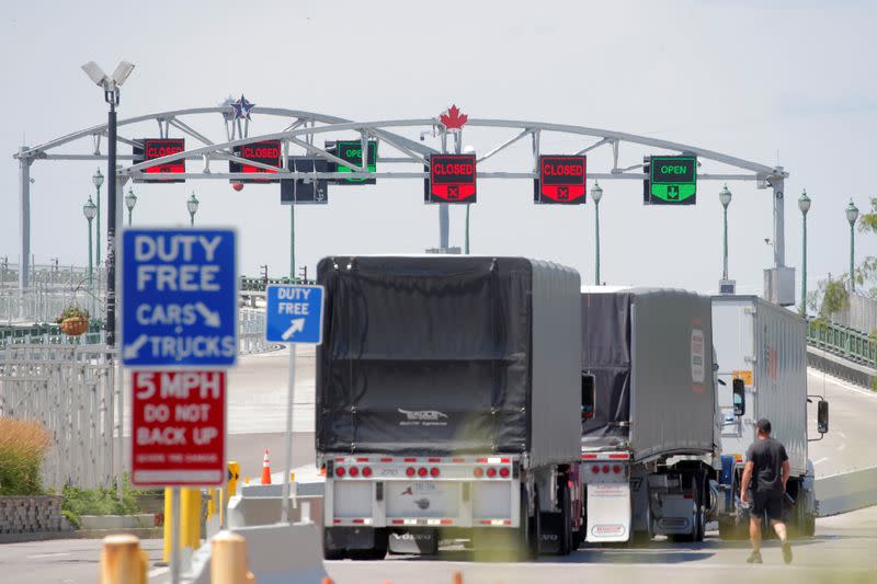 FILE PHOTO: Trucks prepare to cross The Peace Bridge, which runs between Canada and the United States, over the Niagara River in Buffalo, New York