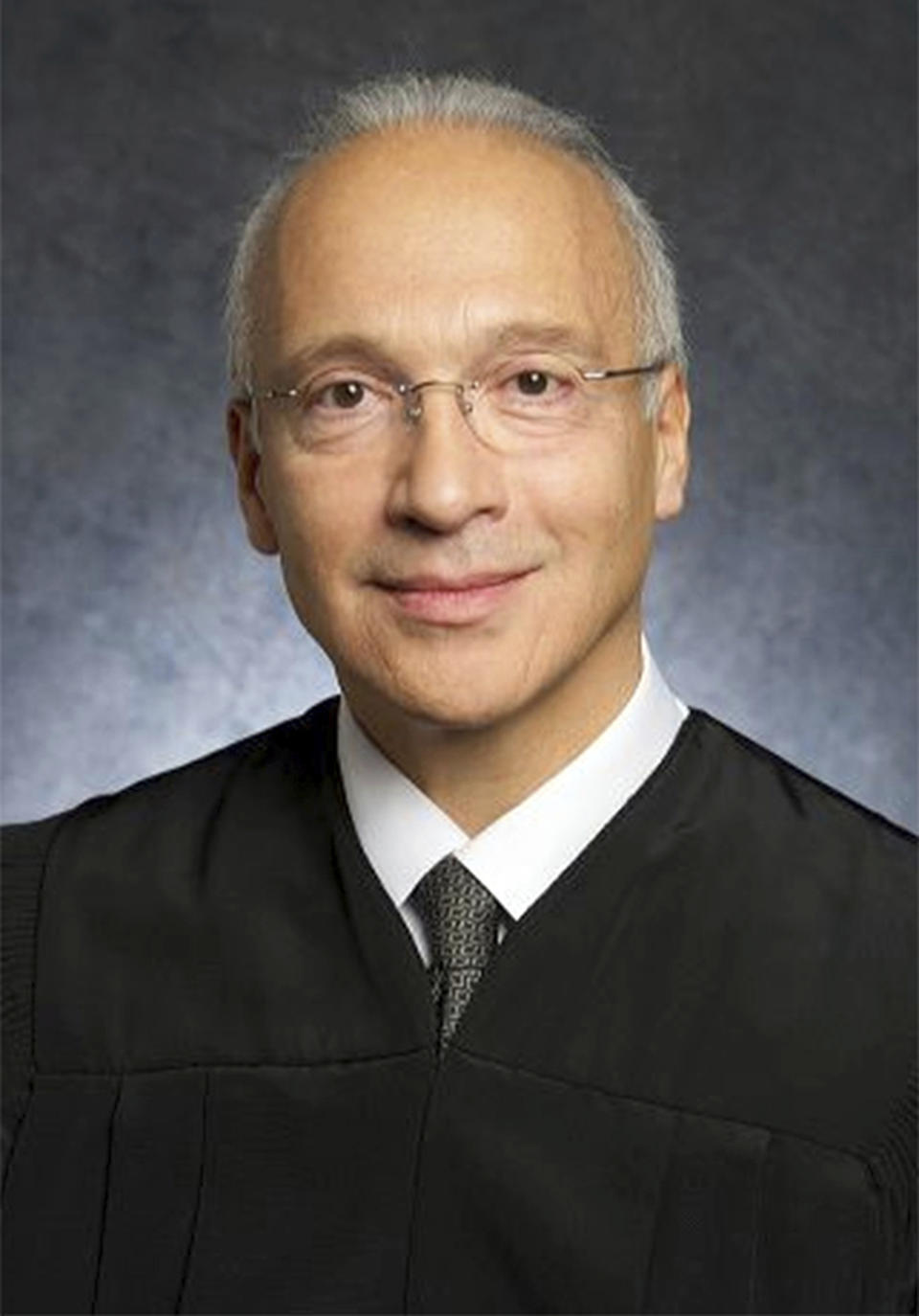 FILE - This undated photo provided by the U.S. District Court shows Judge Gonzalo Curiel. A federal appeals court will hear arguments Tuesday, Aug. 7, 2018, by the state of California and advocacy groups who contend the Trump administration overreached by waiving environmental reviews to speed construction of the president’s prized border wall with Mexico. California is appealing a decision by U.S. District Judge Curiel of San Diego, who sided with the administration in Feb. 2018. (U.S. District Court via AP, File)
