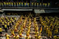 Inmates participate in a group dance contest inside the Quezon City Jail