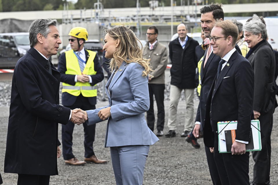 US Secretary of State Antony Blinken greets Sweden's Energy and Industry Minister Ebba Busch during a visit to Hybrit to participate in a meeting arranged by Sweden's EU presidency in the Trade and Technology Council between the EU and the US in Lulea, Sweden, Tuesday, May 30, 2023. To the right Sweden's Minister for Foreign Affairs Tobias Billstrom and Minister for Aid and Foreign Trade Johan Forsell. (Jonas Ekstroemer/TT News Agency via AP)