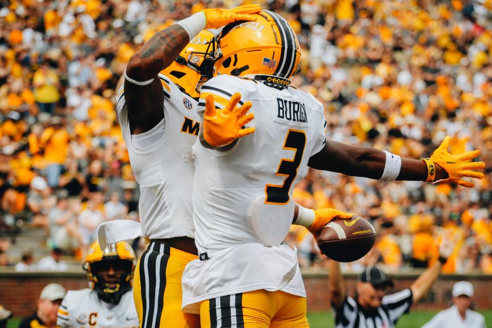 Missouri's Luther Burden (3) celebrates with a teammate after a score during the Tigers' 34-17 over Abilene Christian on Sept. 17, 2022.