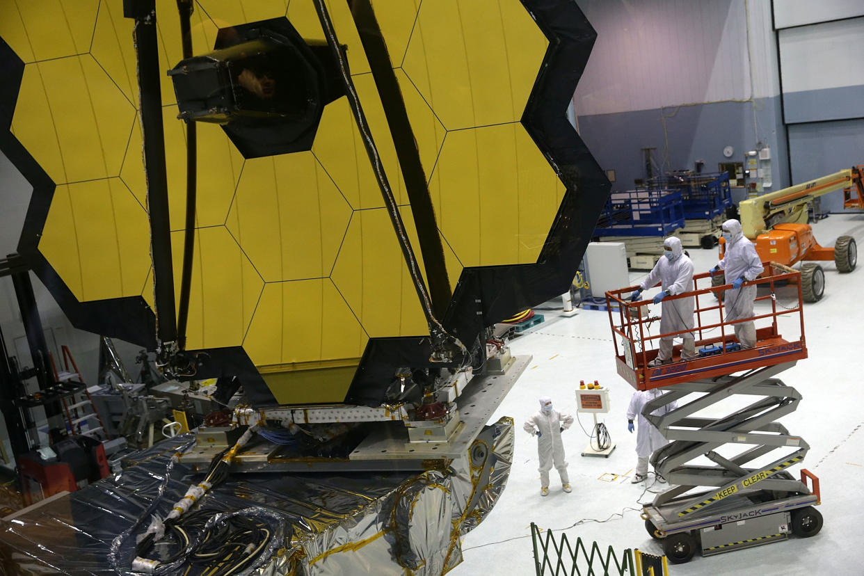 GREENBELT, MD - NOVEMBER 02:  Engineers and technicians assemble the James Webb Space Telescope November 2, 2016 at NASA's Goddard Space Flight Center in Greenbelt, Maryland. The telescope, designed to be a large space-based observatory optimized for infrared wavelengths, will be the successor to the Hubble Space Telescope and the Spitzer Space Telescope. It is scheduled to be launched in October 2018.  (Photo by Alex Wong/Getty Images)