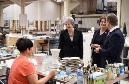 Britain's Prime Minister Theresa May and Arlene Foster, the leader of the Democratic Unionist Party (DUP) visit Belleek Pottery, in St Belleek, Fermanagh, Northern Ireland, July 19, 2018. REUTERS/Clodagh Kilcoyne
