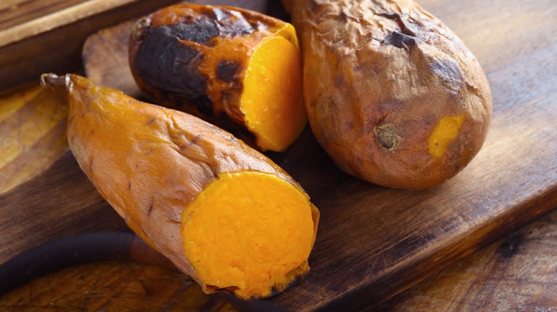 Roasted sweet potatoes on a cutting board