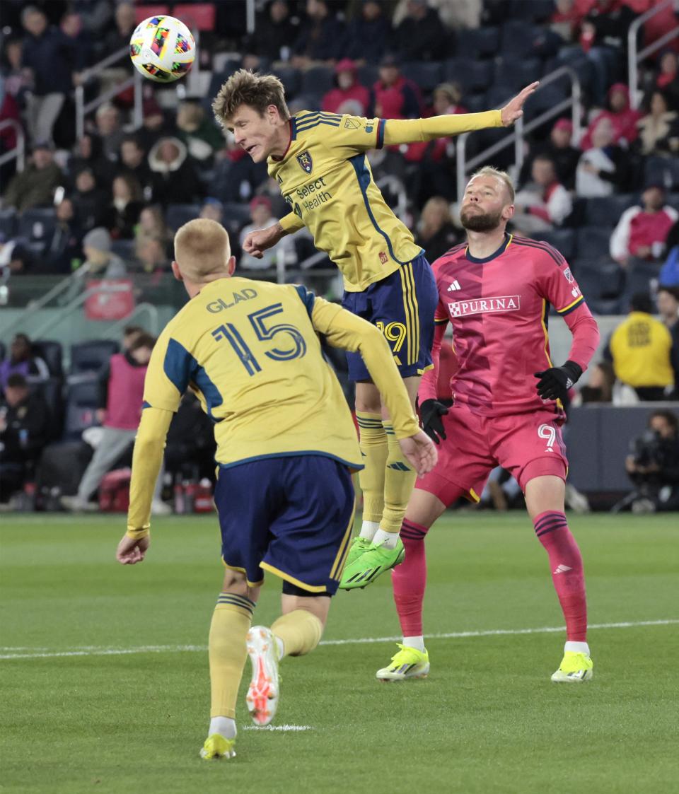 Real Salt Lake midfielder Bode Hidalgo (19) heads the ball away from St. Louis City SC forward Klauss (9) during first-half MLS soccer match action Saturday, Feb. 24, 2024, St. Louis. (Laurie Skrivan/St. Louis Post-Dispatch via AP)