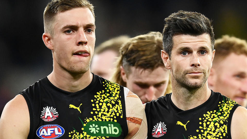 Richmond players Tylar Young and Trent Cotchin.