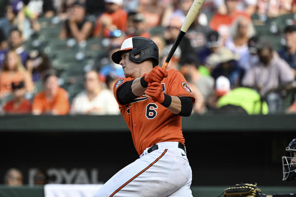 Baltimore Orioles' Ryan Mountcastle (6) hits a single against Pittsburgh Pirates starting pitcher JT Brubaker during the first inning of a baseball game, Saturday, Aug 6, 2022, in Baltimore. (AP Photo/Terrance Williams)