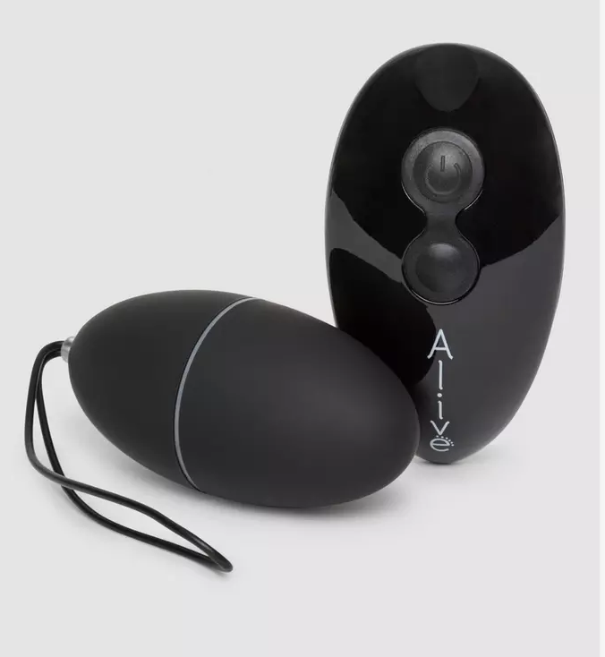 The Alive 10 Function Remote Control Vibrating Love Egg and remote on a grey background