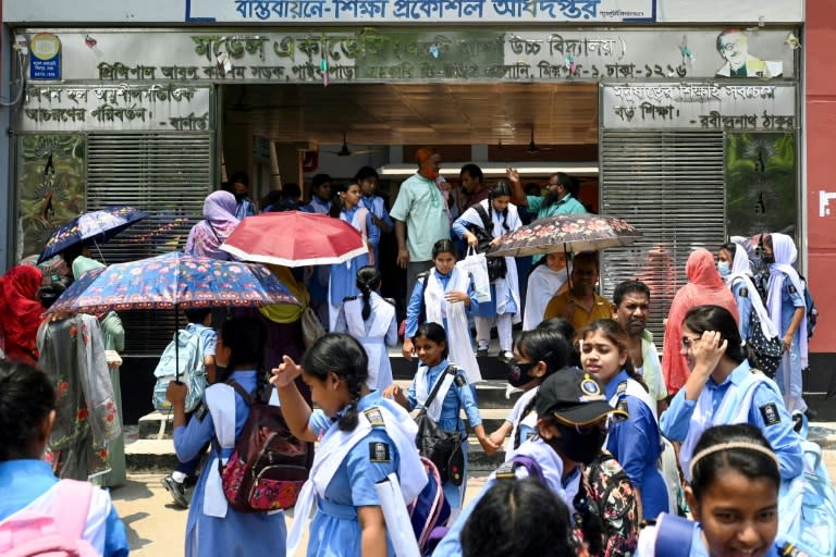 Students returned to classes across Bangladesh after a heatwave prompted a nationwide classroom shutdown (Munir UZ ZAMAN)