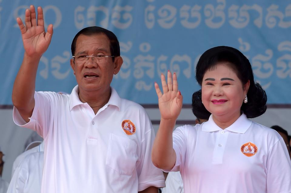 Hun Sen, Prime Minister and leader of the Cambodian People's Party and his wife Bun Rany during a general election campaign in Phnom Penh on July 7, 2018.