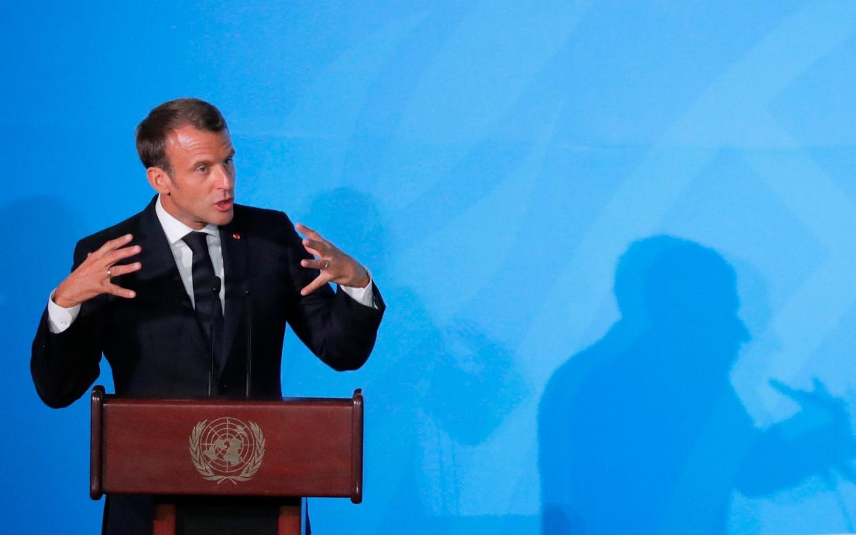 French President Emmanuel Macron speaks during the 2019 United Nations Climate Action Summit  - REUTERS