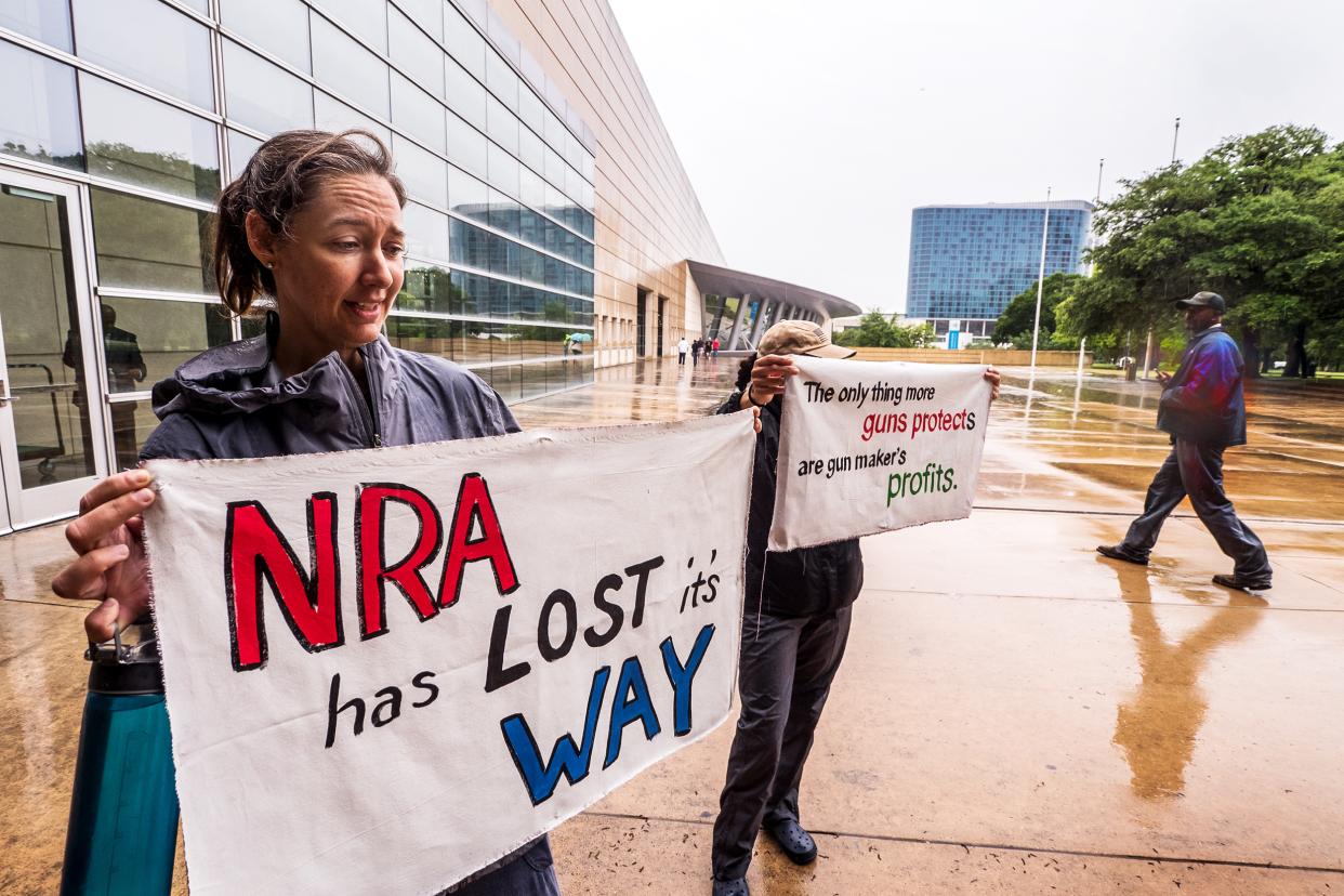 Woman protesting the NRA