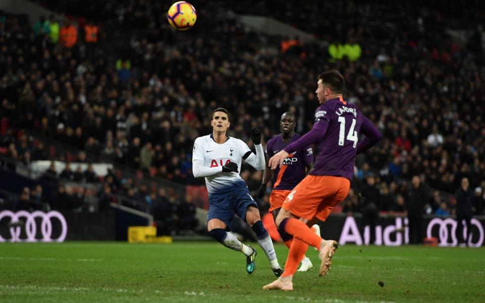 Erik Lamela skied the ball over the bar after it appeared to bobble before the Spurs midfielder hit it - Getty Images Europe