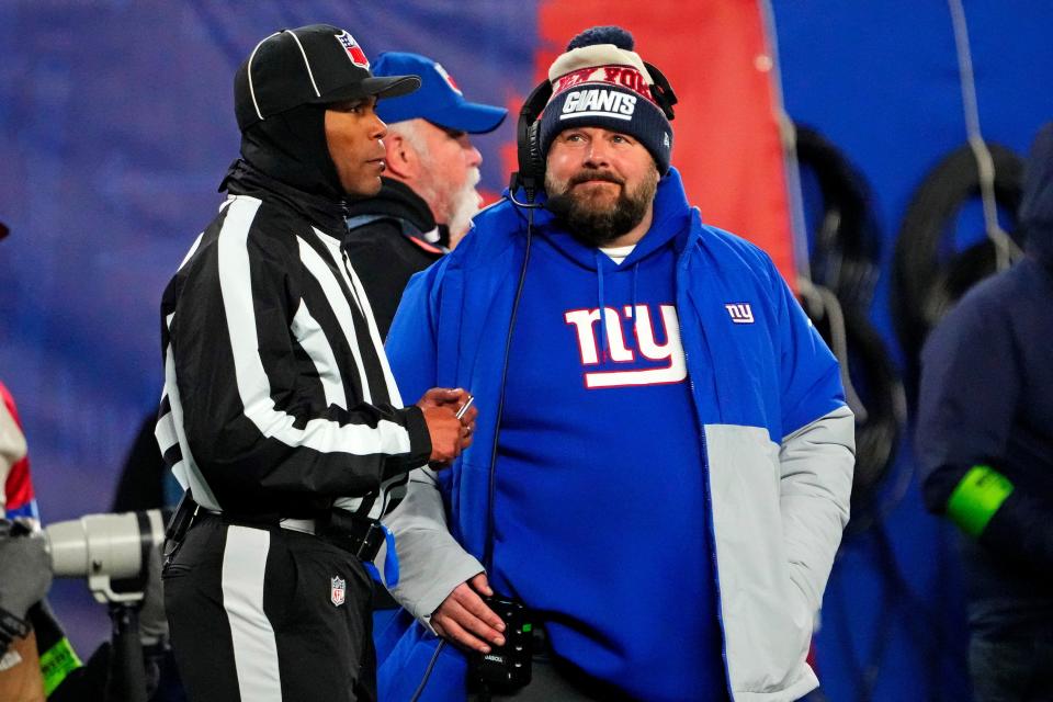New York Giants head coach Brian Daboll talks to an official during a game at MetLife Stadium on Dec. 11, 2023.