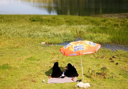 Tourists from the Middle East enjoy on the Prokosko Lake near Fojnica, Bosnia and Herzegovina, August 20, 2016. Picture taken August 20, 2016. REUTERS/Dado Ruvic