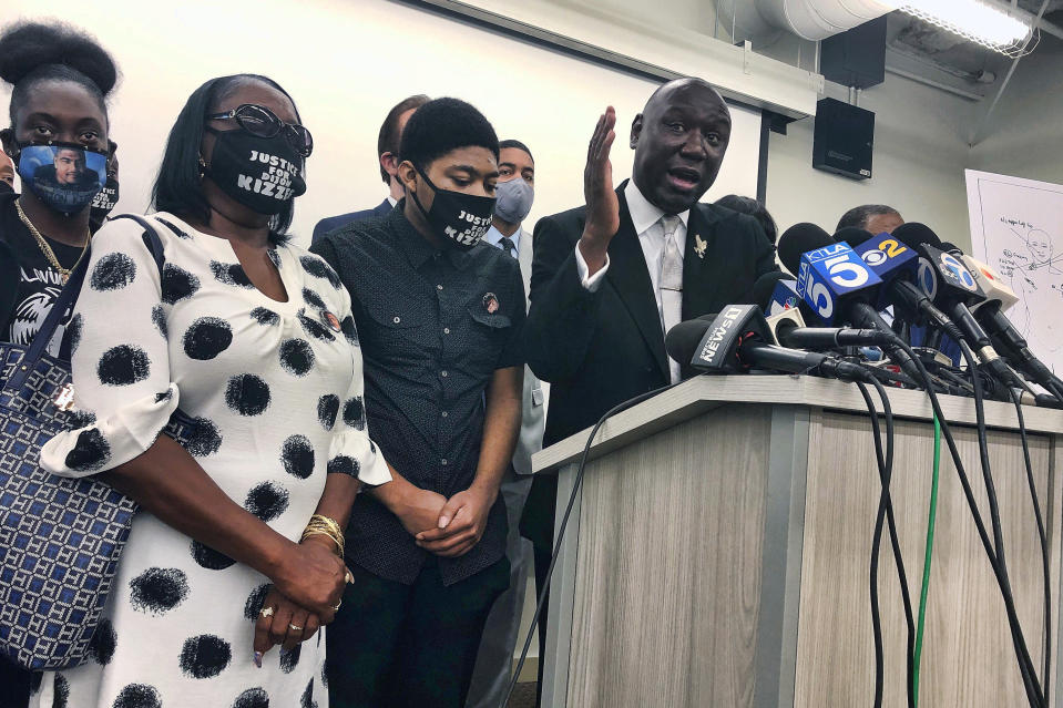 FILE - In this Sept. 22, 2020, file photo, attorney Benjamin Crump speaks alongside members of Dijon Kizzee's family during a news conference in Los Angeles. The family of Kizzee, a Black man who was shot and killed by sheriff's deputies after they tried to detain him for allegedly riding a bicycle illegally, is seeking $35 million in damages from Los Angeles County. Kizzee, 29, was killed Aug. 31, 2020, in South Los Angeles after two deputies tried to stop him for riding a bicycle in the wrong direction. He dropped the bike and ran away, carrying a bundle of clothing that authorities say contained a firearm. (AP Photo/Stefanie Dazio, File)