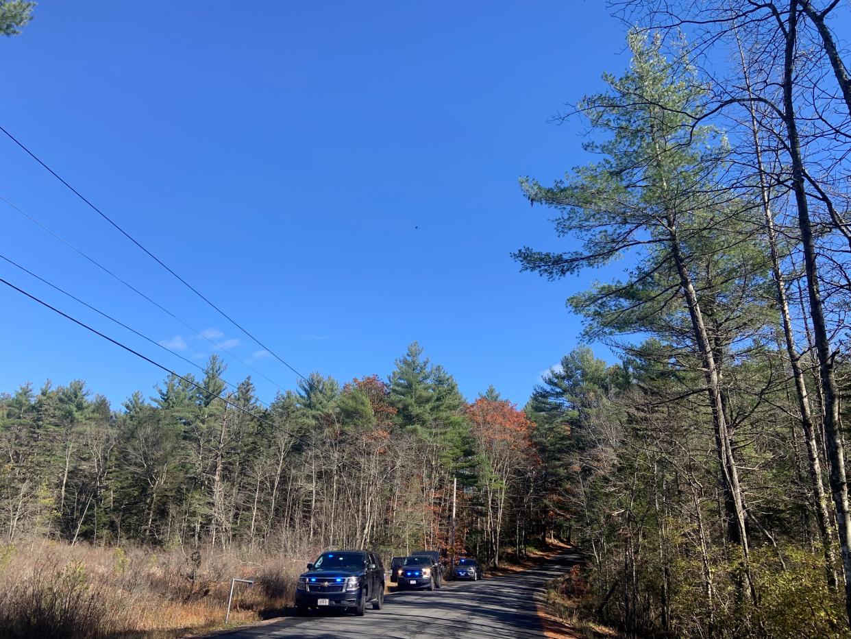 A Mass. State Police drone is seen overhead on Kelton St. in Gardner while state police are looking for Aaron Pennington