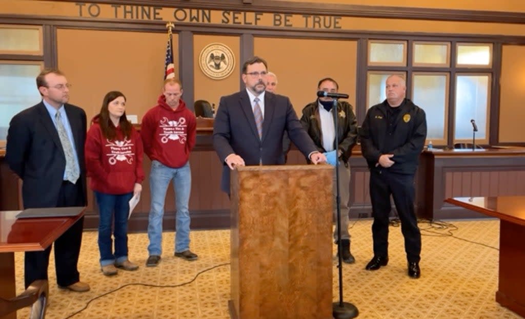 First Circuit District Attorney’s Office John Weddle holds a press conference announcing the development along with the daughter of Felicia Cox  (First Circuit District Attorney’s Office/Facebook)