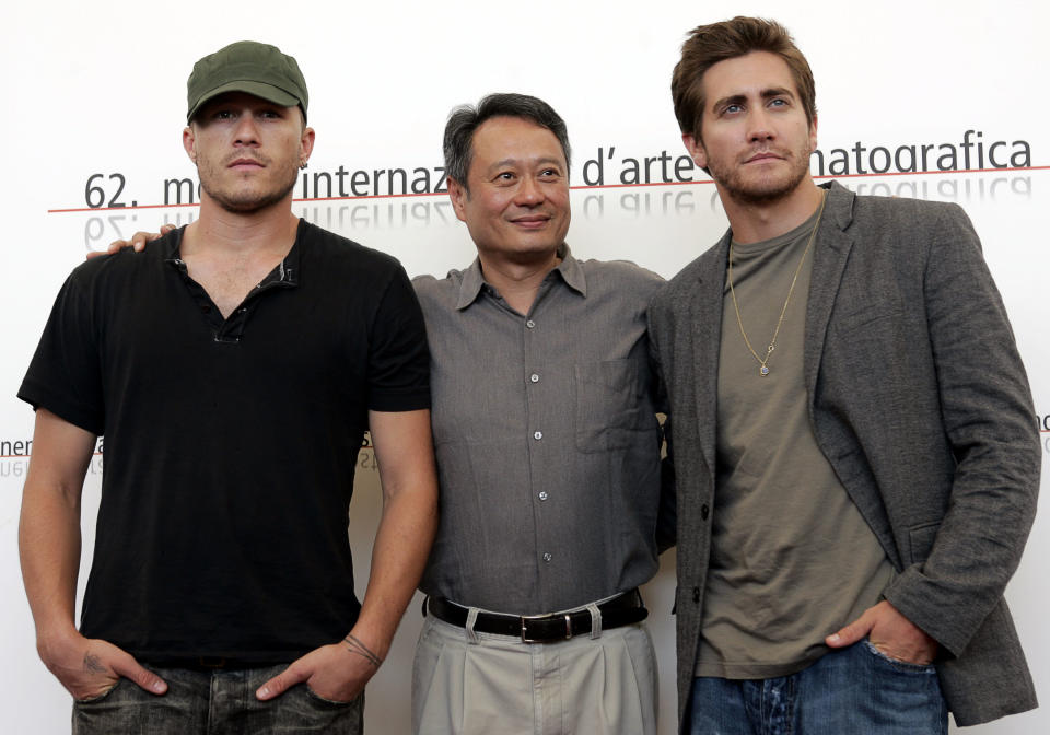 Chinese movie director Ang Lee, center,is flanked by Australian actor Heath Ledger, left, and US actor Jake Gyllenhaal during a photocall after a press conference to present their latest movie "Brokeback Mountain" at the 62nd edition of the Venice Film Festival in Venice's Lido, northern Italy, Friday, Sept. 2, 2005. (AP Photo/Domenico Stinellis)