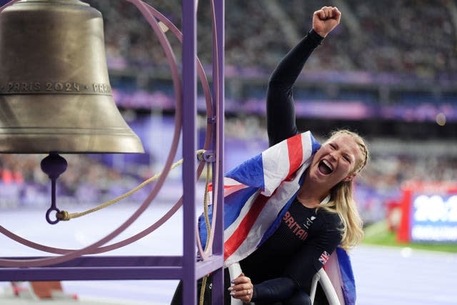 Great Britain's Sammi Kinghorn celebrates after winning 100m gold at Stade de France