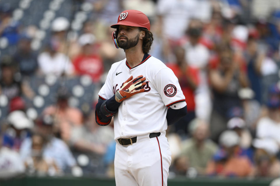 Washington Nationals' Jesse Winker celebrates his home run at home plate during the eighth inning of a baseball game against the New York Mets, Thursday, July 4, 2024, in Washington. The Nationals won 1-0. (AP Photo/Nick Wass)